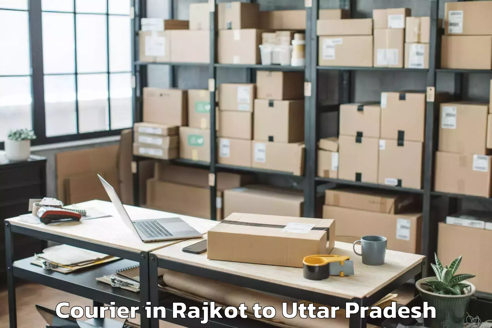 Reliable Rajkot to Usehat Courier